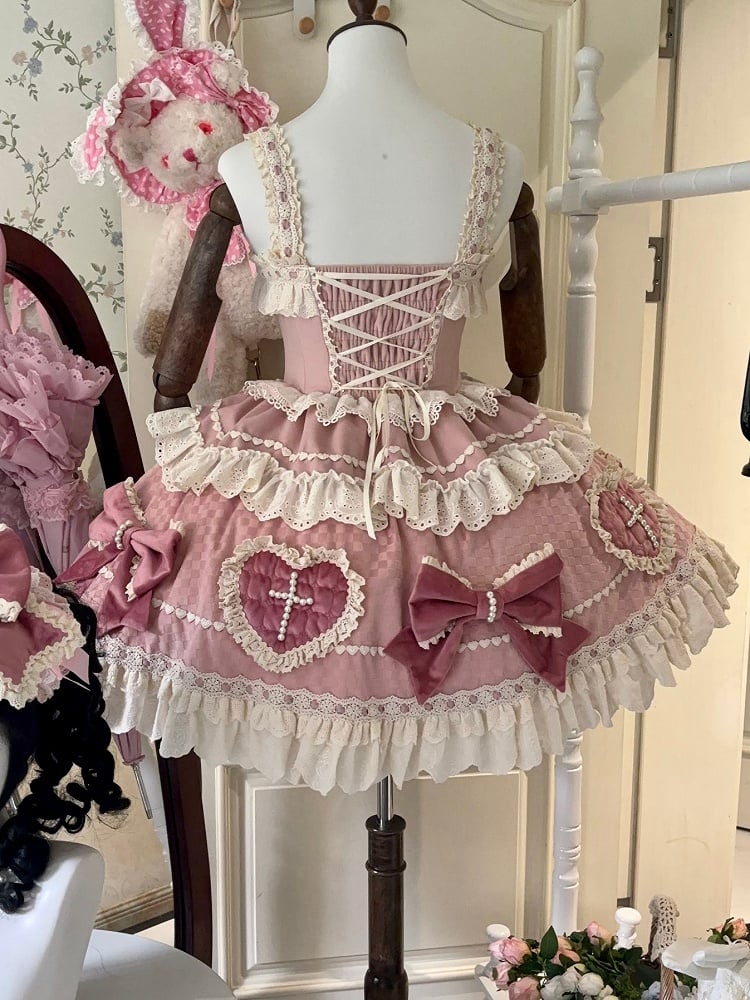 Robe Sweet Lolita rose avec nœuds et jupe en cœur