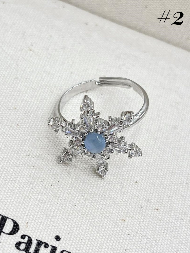 Silberne Ohrringe/Ring/Halskette in Schneeflockenform