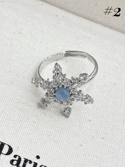 Silberne Ohrringe/Ring/Halskette in Schneeflockenform