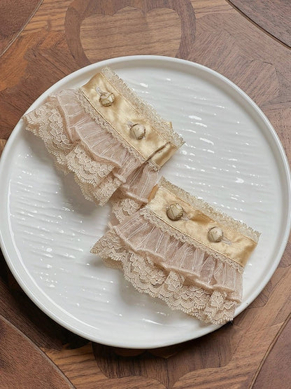 Champagner / Silber SchwarzGold Handfesseln