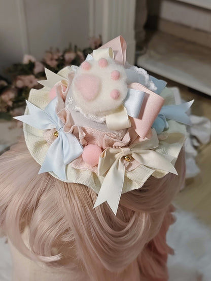 und Lolita Hut verziert Mini Schleifen Pompons süß