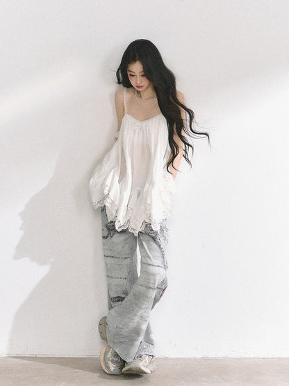 Hellgraue Jeans mit weitem Bein und niedriger Taille und Kettenmuster im Used-Look