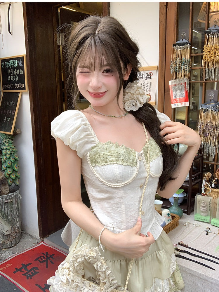 アプリコットのスウィートハートネックラインのパフスリーブのスイートトップス