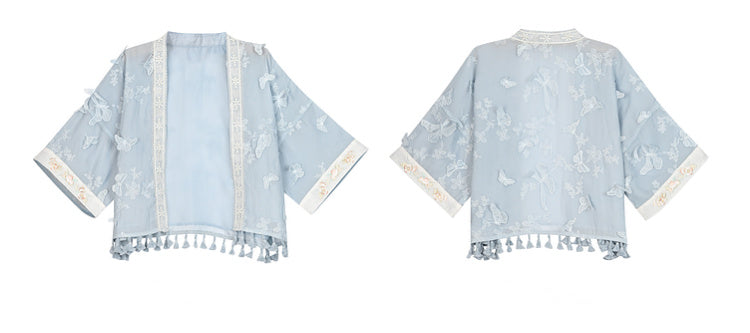 Top mit Quasten und Schmetterlingsdesign, blauer Saum, lange Stickerei, florale Ärmel