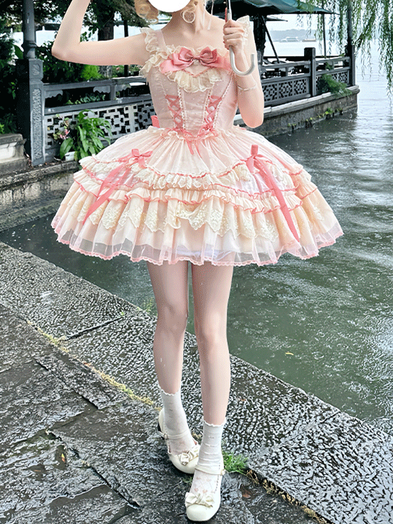 Süßes Lolita-Kleid mit Schleife, flatterndes rosa Mieder mit Schnürung, hoch taillierte Ärmel mit großem, abnehmbarem Pulloverrock