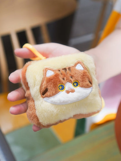 かわいいキティ柄のイエロー＆ブラウンの漫画風コインケース