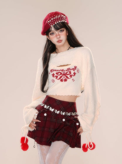 ピンクアプリコットの蝶結びクロップドトップス（シュラッグ付き）