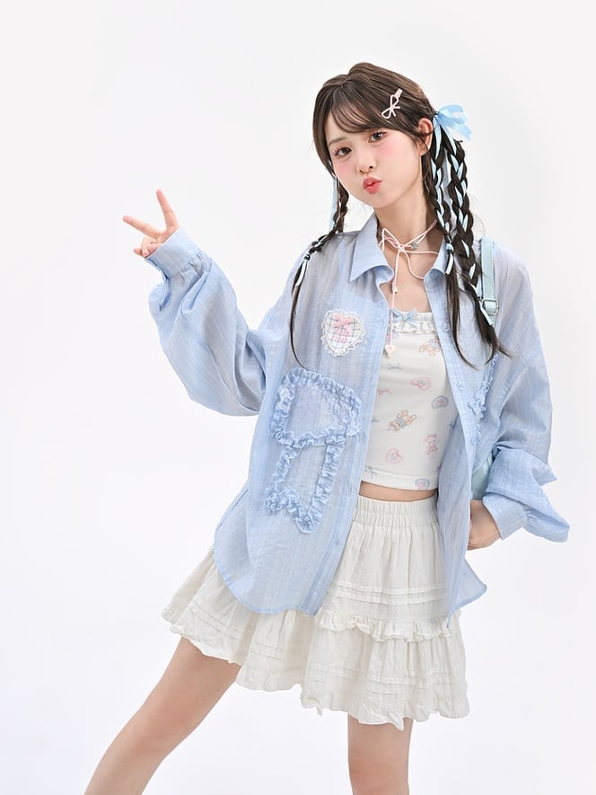 セミシースルーのフリル付き蝶結びアップリケ付きブルーサンプロテクションシャツ