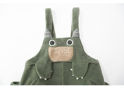 かわいい恐竜の緑のぬいぐるみオーバーオール