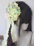 Gelbe Haarspange mit Zitronendruck und grüner Schleife