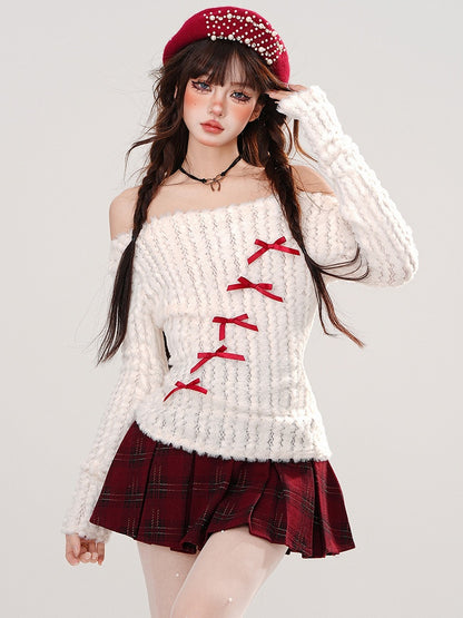 ホワイトのリボンディテール、オフショルダーネックラインセーター