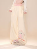 Beige Wide-Leg Pants with Pink Waistband and Embroidered Puppy Design