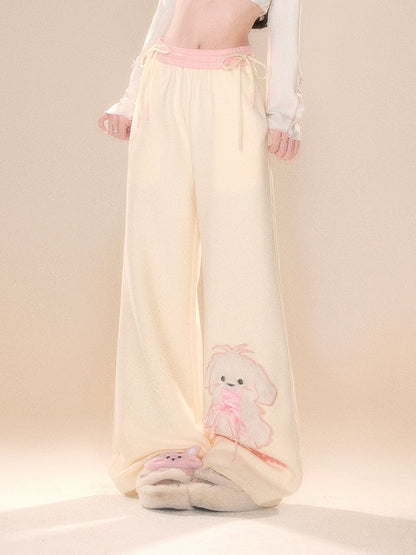 Beige Wide-Leg Pants with Pink Waistband and Embroidered Puppy Design