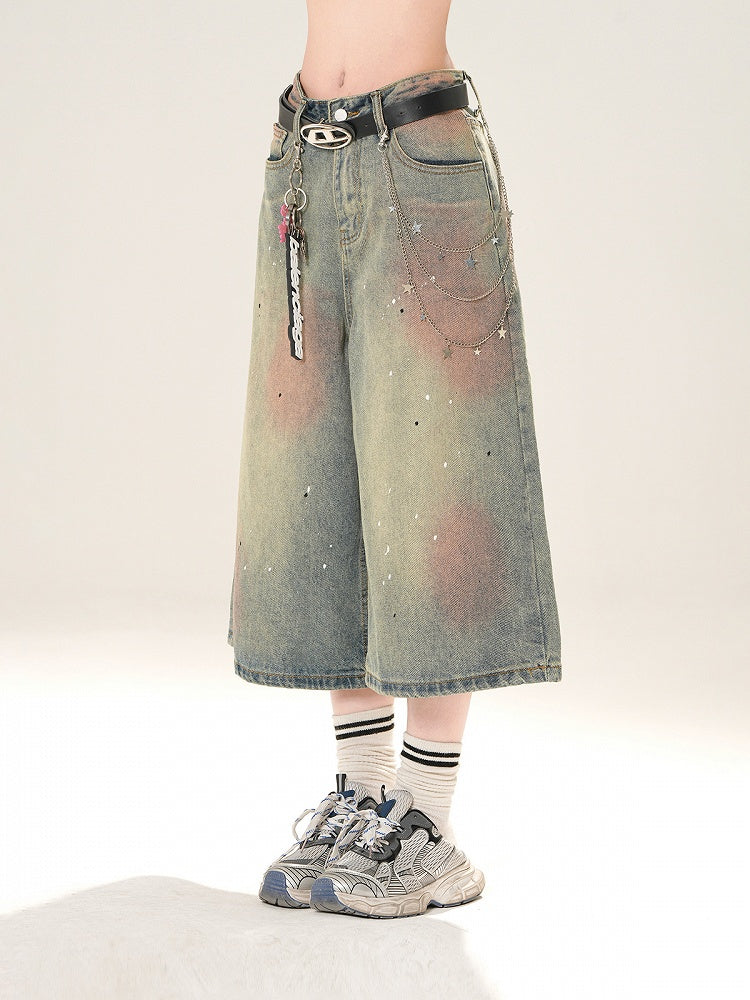 ブルーのローライズ ダメージ加工 スパンコールディテール ストレートレッグジーンズ