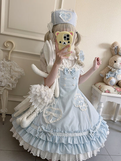 Blaues Lolita-Kleid mit Rüschensaum und Lagenmuster und Polka-Dot-Muster