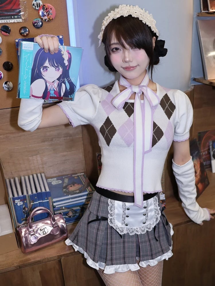 Grau karierter Minirock mit Rüschenbesatz und Schürzendesign