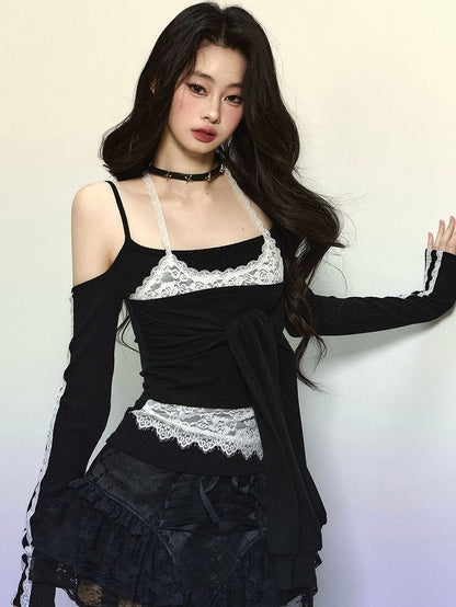 Schwarzes Neckholder-Oberteil mit langen Ärmeln und auffälligem Bindeakzent