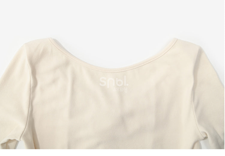 Aprikosenfarbenes, langärmliges Oberteil mit Spitzenbesatz und Schleifendetails