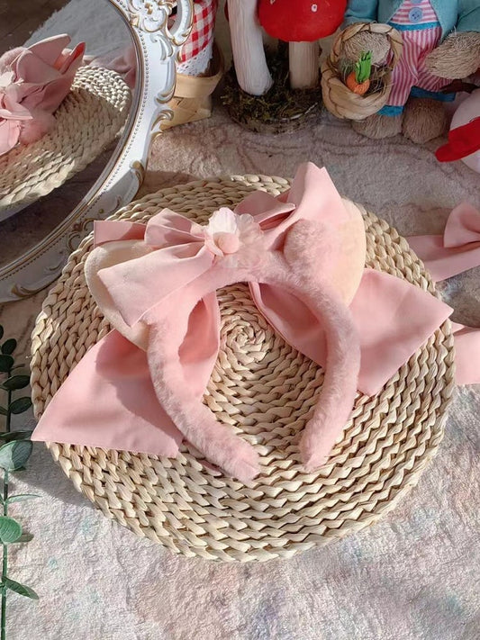 ピンクの蝶結びぬいぐるみ耳KC