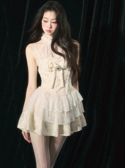 アプリコットホルターネックリボンティアードスカートドレス