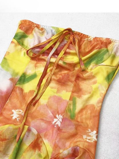 プリントトップ ラッフルアクセント オレンジチューブ ホリデーフローラルカスケーディング