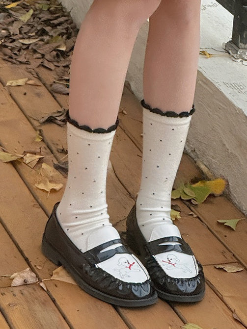 Wadenlange Socken mit gerüschtem Bündchen und Tupfenmuster