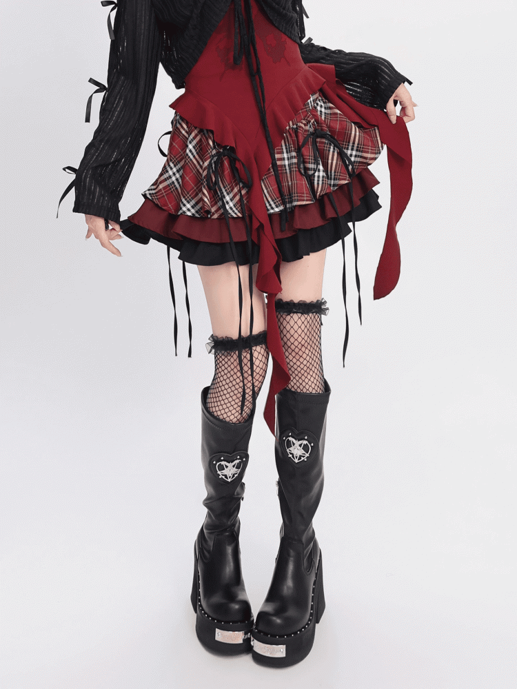 Karierter Stufenrock und rot-schwarz-weiße Schleifendekoration Y2K /