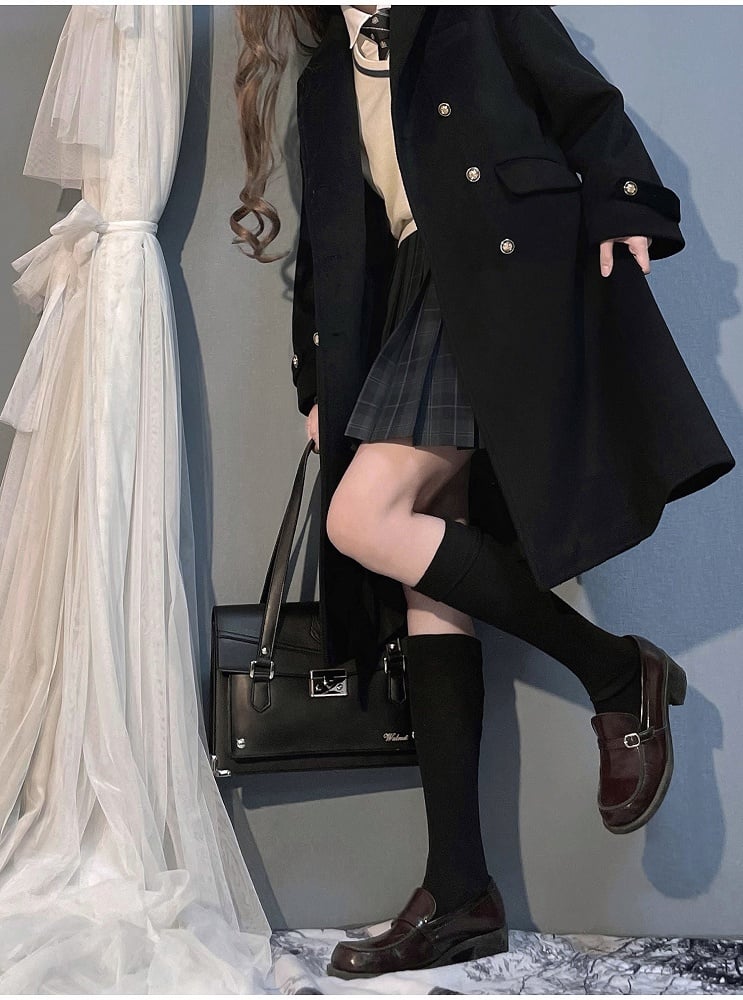 Schwarzer zweireihiger Wollmantel mit Reverskragen