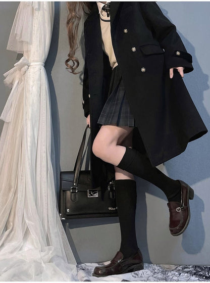 Schwarzer zweireihiger Wollmantel mit Reverskragen