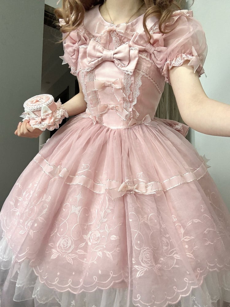 Rosa Bluse mit Puffärmeln und Peter-Pan-Kragen