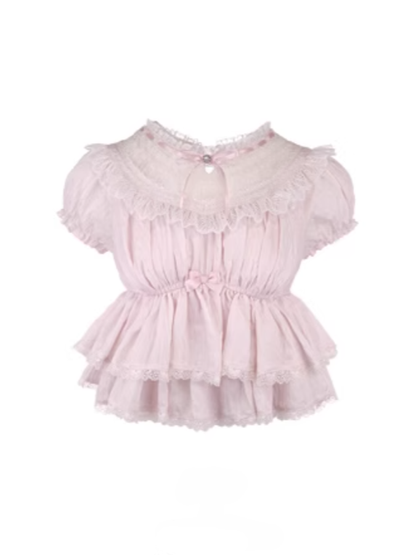 Spitzenbesatz am Saum mit Schößchenoberteil und rosa Puffärmeln