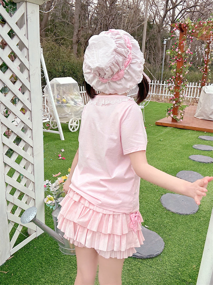 ピンクの伸縮性ウエスト、蝶結び、サイドアクセント、ティアードフリル、ブルマー