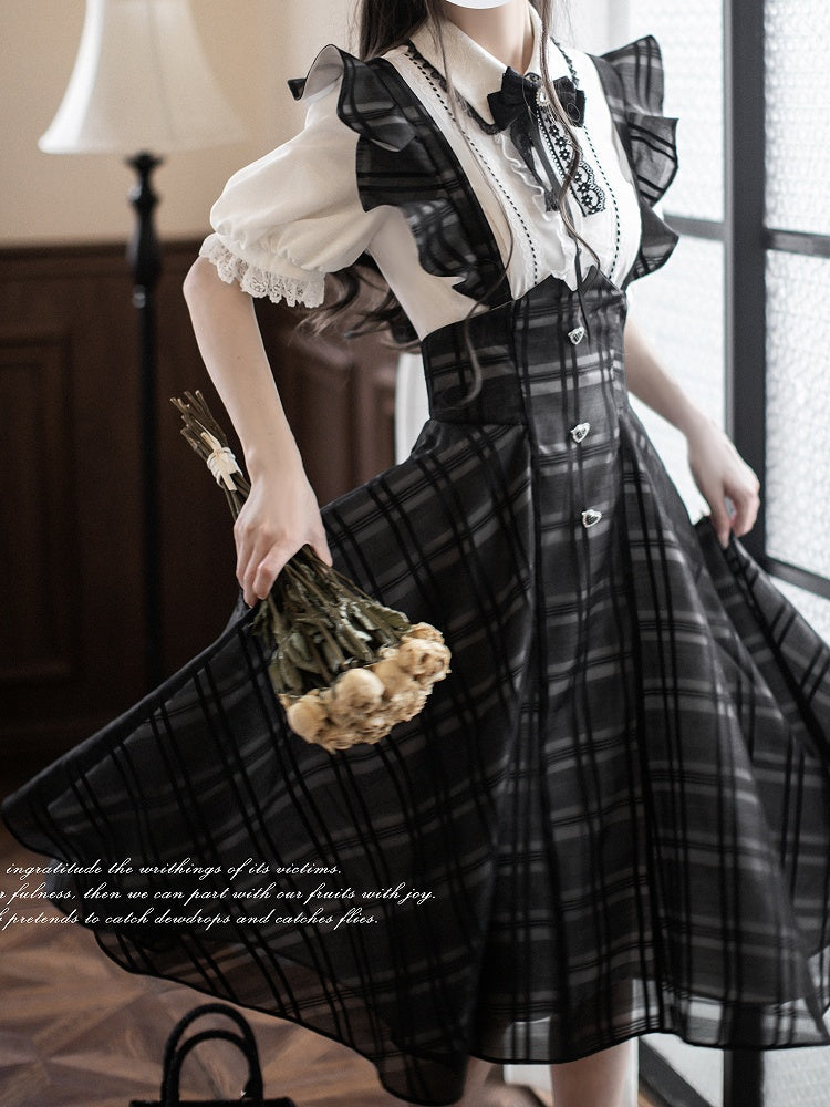 Baskisch mit Jirai-Overallkleid in Kei-Schwarz mit Karomuster, lange Taille, Version mit umgedrehten Flatterärmeln