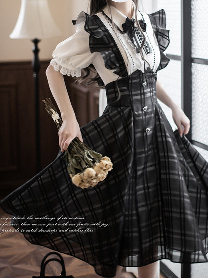 Baskisch mit Jirai-Overallkleid in Kei-Schwarz mit Karomuster, lange Taille, Version mit umgedrehten Flatterärmeln