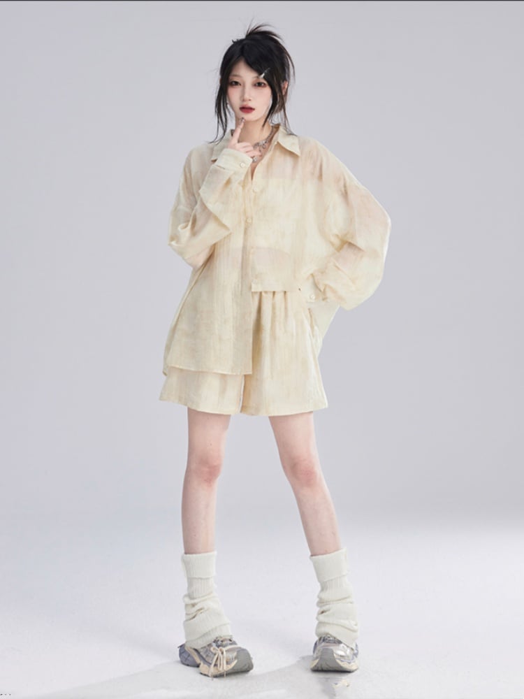 Aprikosenfarbenes, halbtransparentes Sonnenschutz-Shirt/lockere Shorts