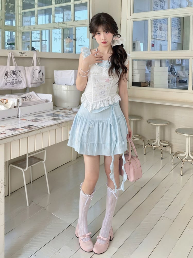 Ärmelloses Top mit gebogenen Ärmeln, weißem Saum, Seestern- und Quallen-Graffiti-Flatter