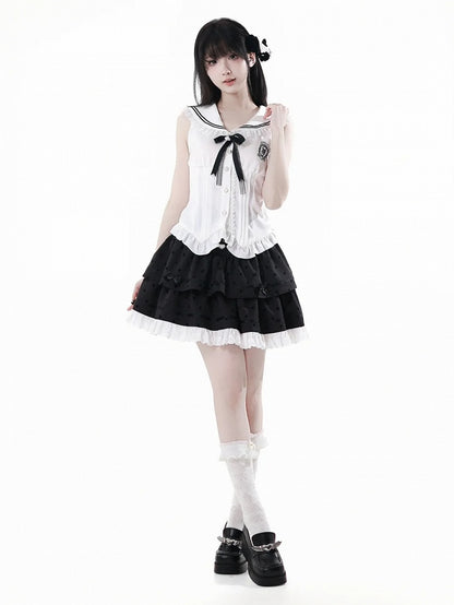 バッジホワイトセーラーカラーカーブヘムノースリーブトップスと取り外し可能な蝶結び付き