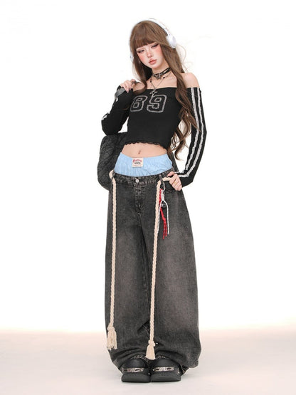 Weit geschnittene Jeans mit gestreiftem, kariertem Bund