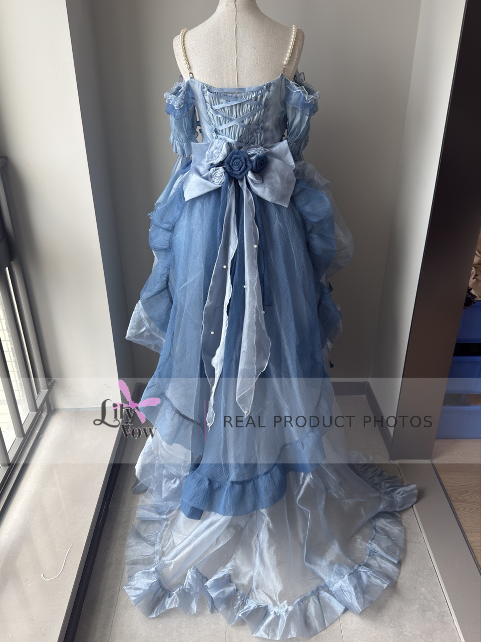Blue pearl chain high-low Lolita dress back view with lace-up train – LilyVow real product photo