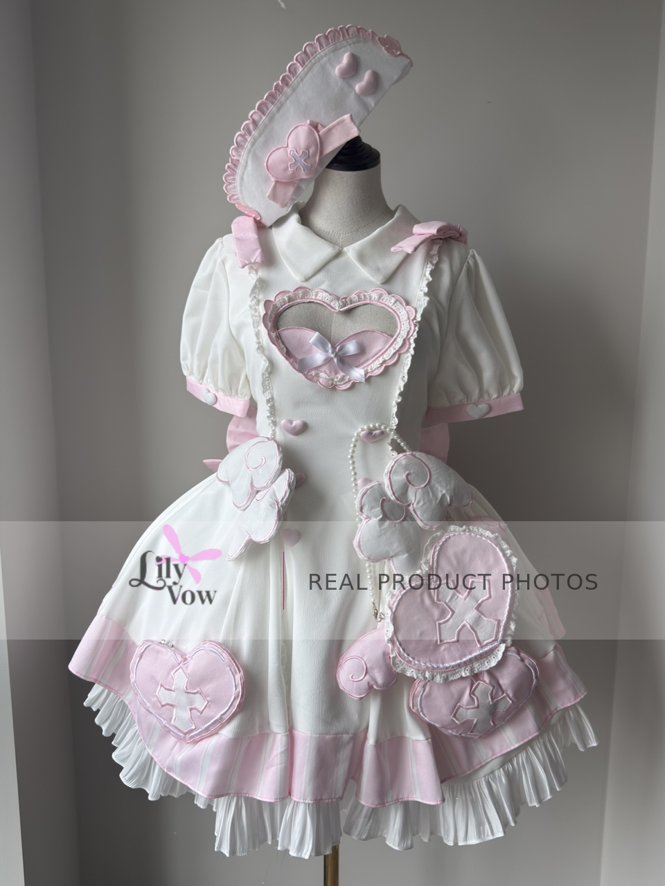 Front real product photo of pink Holy Cross Healing sweet Lolita full set