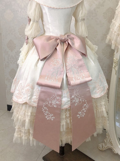 Nœud de train / Grande broderie florale vert-rose sur fond noir