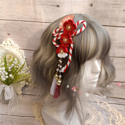 扇形のタッセルが特徴の桜ヘアクリップ