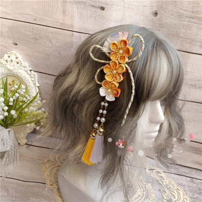 扇形のタッセルが特徴の桜ヘアクリップ