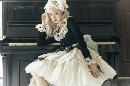 Schwarze, lange, gemütliche Strickjacke mit Schleifenärmeln und Spitzenbesatz, zarten Akzenten und