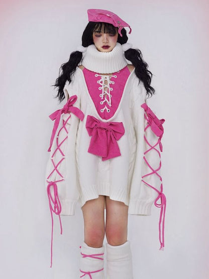 ピンクの蝶結びの白いタートルネックセーター