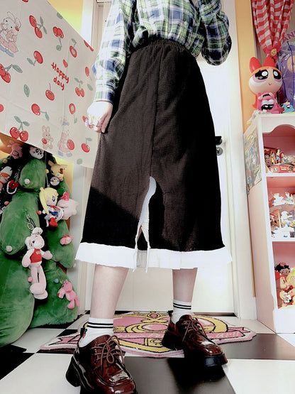 サイドウエストフリルシャーリングブラックスカートスリットトリム