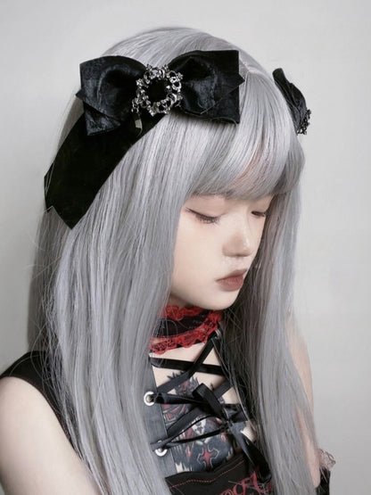 Schwarze Haarspange mit Strasssteinen und Schleife