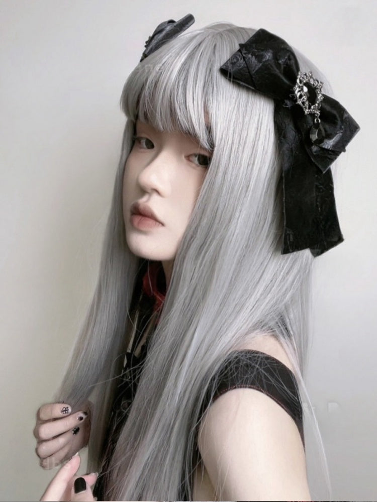 Schwarze Haarspange mit Strasssteinen und Schleife