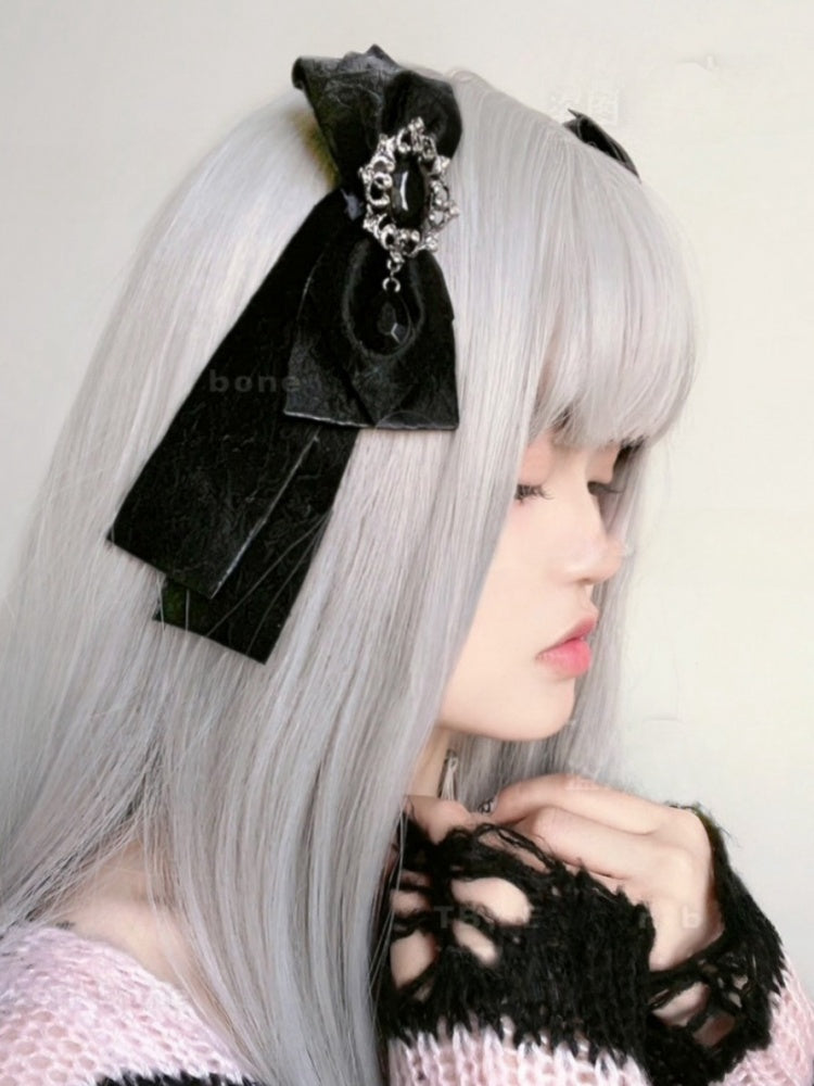 Schwarze Haarspange mit Strasssteinen und Schleife