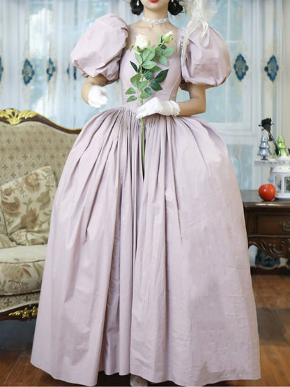 ライトピンクのショートパフスリーブコルセットベルズドレス